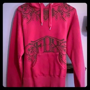 Woman’s pink fox hoodie from year 2010